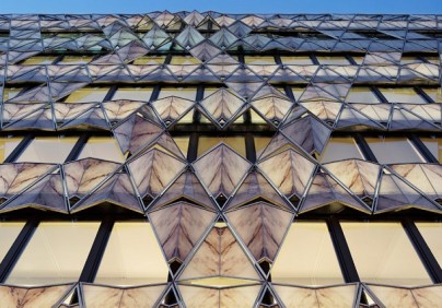 "Situated in a luxurious parisian neighborhood, Manuelle Gautrand's 'origami office building' strove to create a distinct, elegant mark on the urban fabric."
